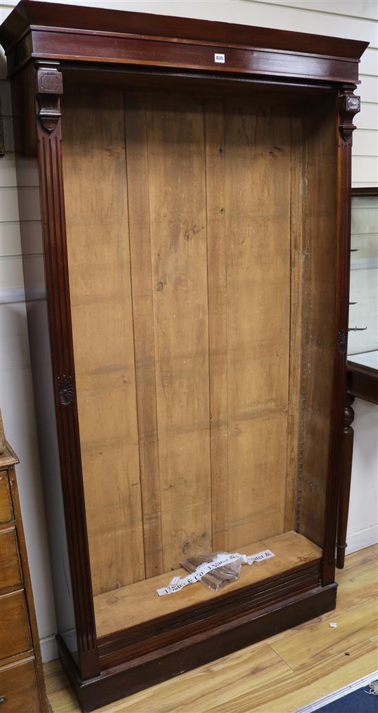 An early Victorian carved mahogany open bookcase fitted six adjustable shelves, W.108cm